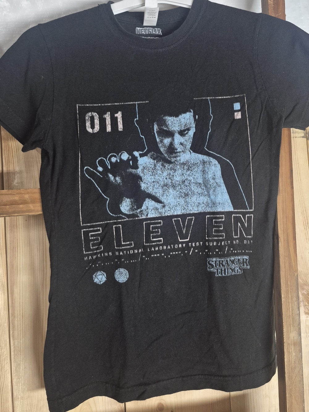 Netflix Stranger Things Eleven Black and Light Blue Short Sleeve Tee